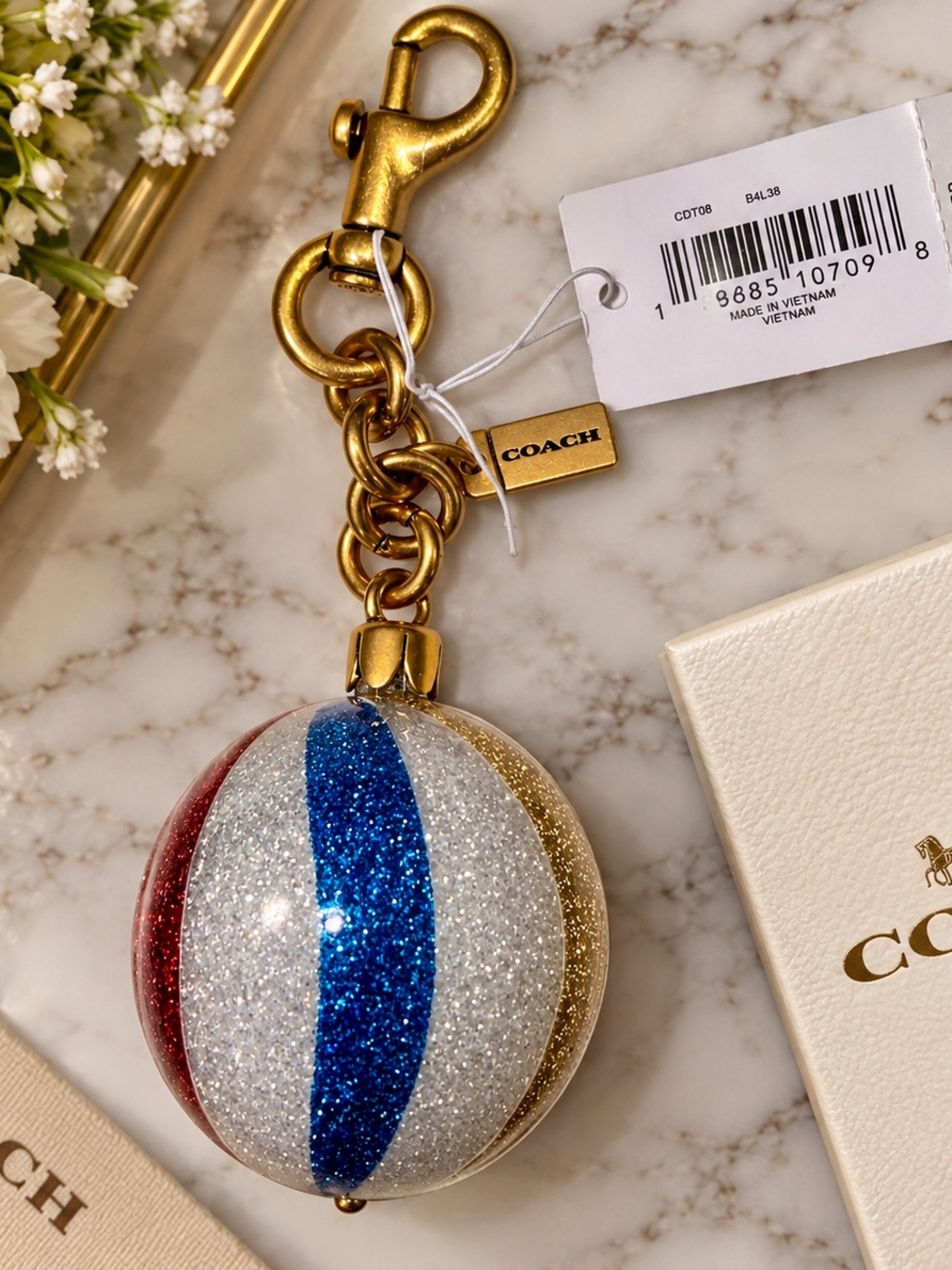 COACH Glitter Stripe Ornament Key & Bag Charm in Red, Blue, Gold